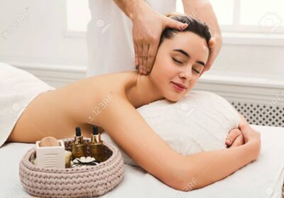 94959481-professional-massage-advertisement-concept-young-woman-getting-classical-body-therapy-with-organic
